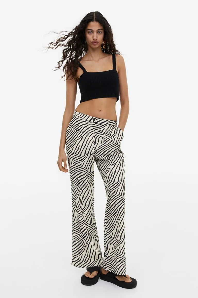 H&M flared trousers, cream/zebra print