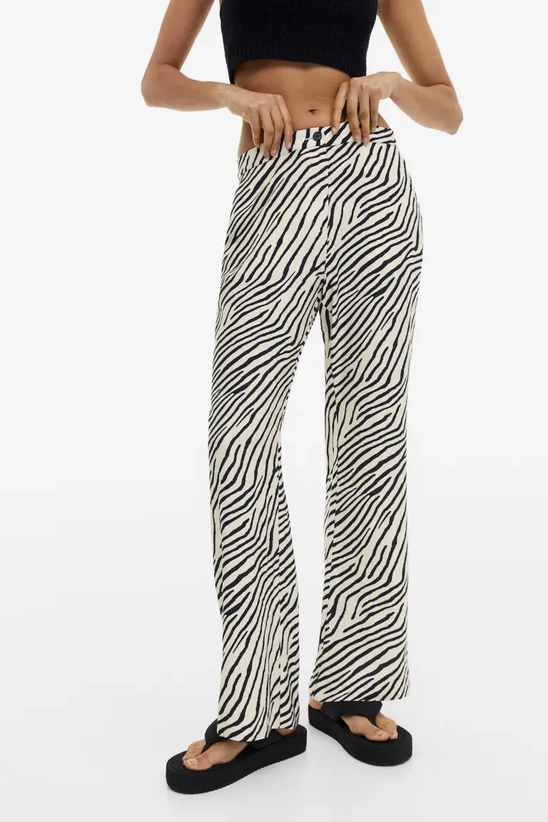 H&M flared trousers, cream/zebra print